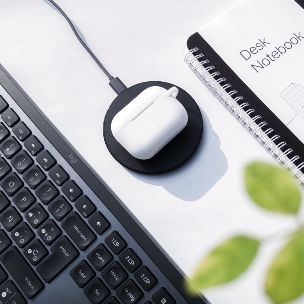 a computer mouse sitting on top of a keyboard